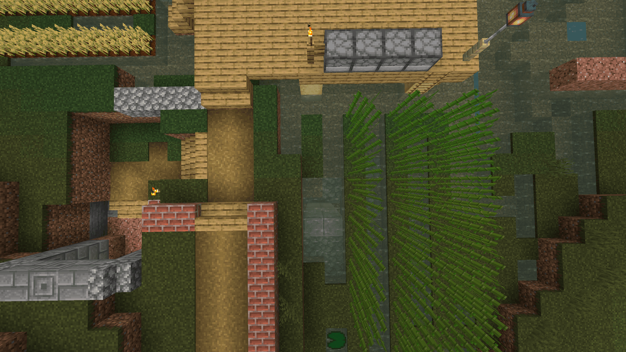 It's a little hard to see, but you can swim down by those two diorite blocks and enter the storage area via waterfall.